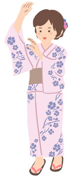 浴衣を着て踊る若い女性　イラスト