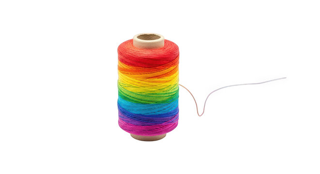 Colorful rainbow yarn spool with a loose thread isolated on transparent background
