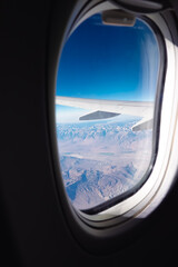 Fototapeta premium View Outside of a Plane Window in Flight from Las Vegas Nevada USA area