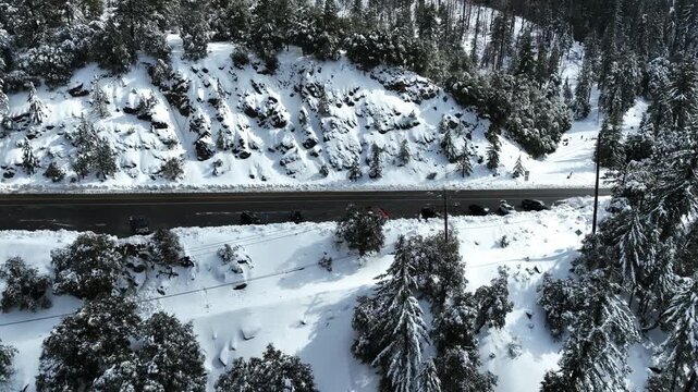 The California San Gorgonio San Bernardino Mountain Range near the Santa  Ana Watershed covered in snow along SR 38 through the Mountain Pass