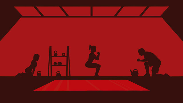 People exercise in a gym setting during a group fitness training session.