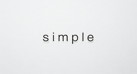 Fototapeta premium Minimalist Typography Featuring the Word Simple on a Clean White Background.