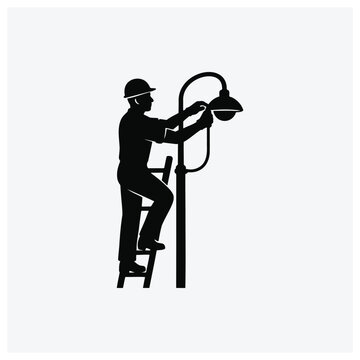 Worker repairing or maintaining a street lamp or light fixture