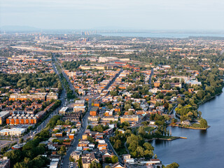 Obraz premium Aerial view of Rene-Levesque Park lighthouse peninsula in Lachine, Montreal along St Lawrence River at sunset. g.