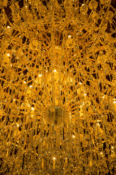 Soft focus of Crystal Chandelier , chandeliers and handmade furniture, the hotel offers first-class comfort in the hall and Decorating. lighting from many lamps or lanterns.	