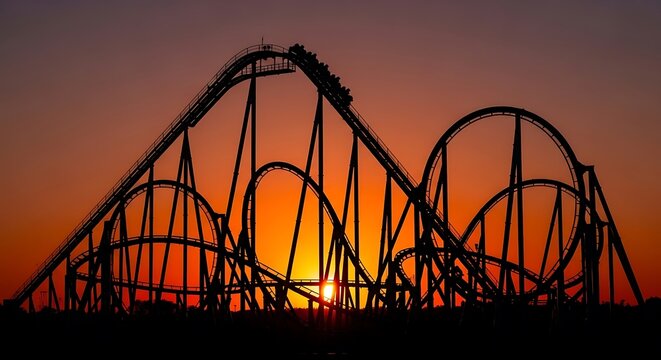 A thrilling roller coaster ride silhouetted against a breathtaking vibrant sunset sky, capturing the excitement and adventure of an amusement park evening