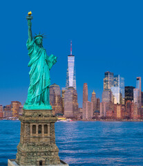 Elections in the USA. Manhattan skyline with Freedom Tower and the Statue of Liberty. New York City skyline banner with the Statue of Liberty. Vote in the USA. NYC skyline with Statue of Liberty. © Volodymyr
