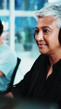 Smile, woman and reading with headphones in office for audio transcription, editing and draft review. Transcriber, mature person and tech at agency for playback software, proofreading and coworking