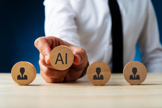 Artificial intelligence transforming human resources. Placing AI wooden blocks among human icons. AI transforming human resources, recruitment automation, workforce transformation, the future of work.