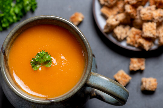 warm comfy cup of winter soup with croutons