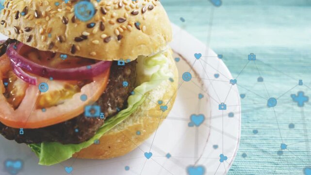 Seeded bun burger centering as camera panning, blue hearts, chat icons highlighting food marketing