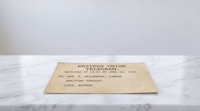 Vintage telegram paper note placed on a white marble table background