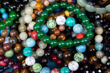 Bracelets made of jade and various gemstones are stacked up.옥과 여러가지 보석으로 만든 팔찌가 쌓여있습니다. © SOOKKYUNG