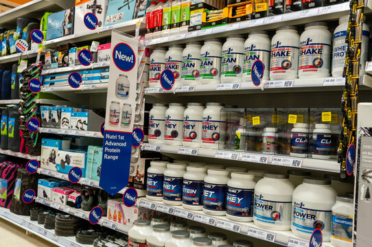 Fitness shakes and keep fit equipment for sale on shelves in a Tesco Store