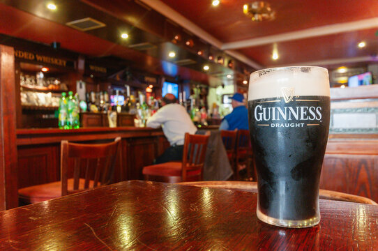 Pint of Guinness in a traditional Irish pub