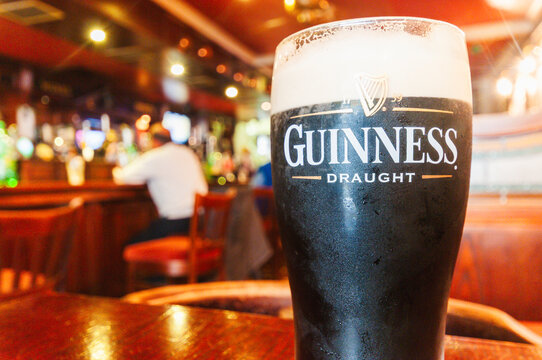 Pint of Guinness in a traditional Irish pub
