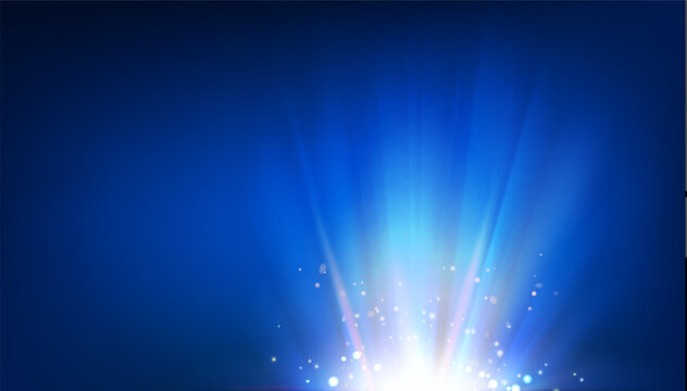 Bright light burst with radial rays on dark background