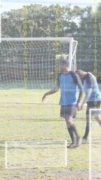 Vertical video: Soccer blue team moving in box, red running causing GK shifting, binary HUD tagging