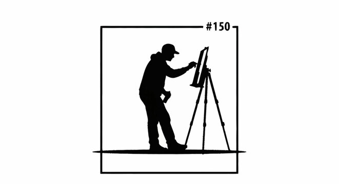 A silhouette of an artist painting on an easel in a studio