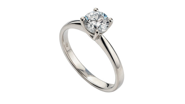 Elegant diamond ring on display with a shiny metal band in a simple setting isolated on transparent background	