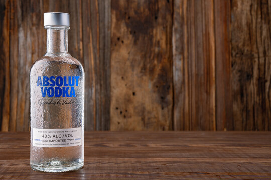 Bottle of Swedish vodka on wooden table