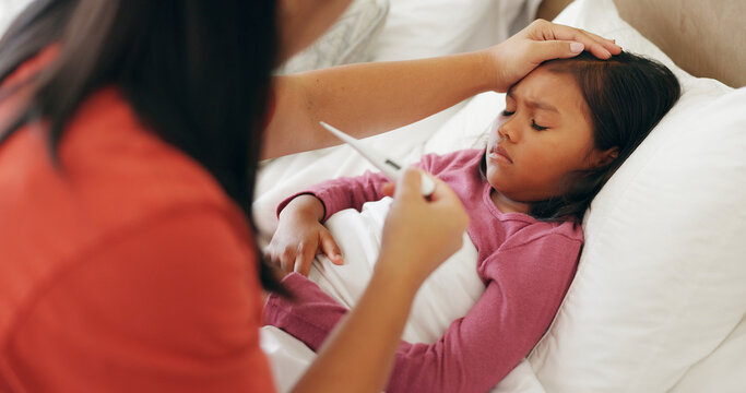 Mom, sick and child with thermometer in bed for fever, temperature or results in home. Mother, kid or checking daughter with head cold for flu symptoms, childcare or influenza in bedroom or house