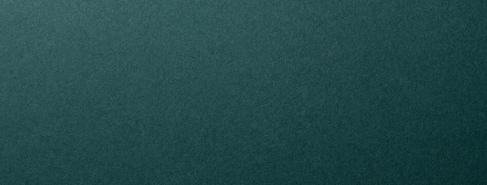 フェルト調の質感のあるターコイズグリーンの紙の背景テクスチャー