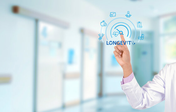  Touching virtual screen displaying a longevity icon. The scene represents modern healthcare, preventive medicine, and the concept of extending healthy lifespan through advanced medical technology.