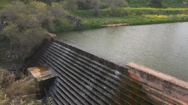Ancient Dam Of Wied il-Qlejgna At Chadwick Lakes In Malta. Aerial drone shot of stone watersteps