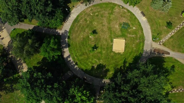Aerial top drone shot over park and kids playground in ostrava city