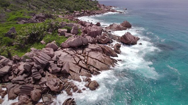 Drone of granites stones, clear turquoise water, untouched nature, anse cocos, La Digue, Seychelles 012.