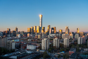 Obraz premium Panorama of Beijing city skyline at sunrise, representing economic recovery, urban growth, and a new beginning in China