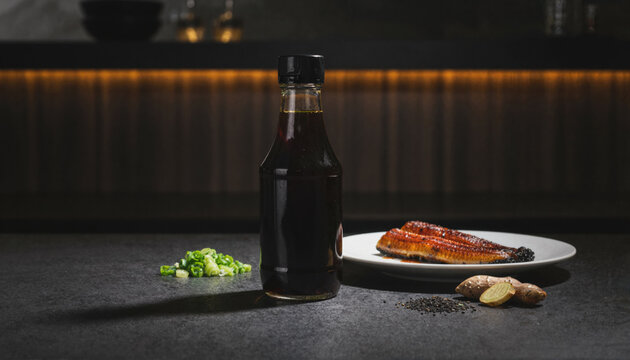 Premium condiment bottle on dark stone in a luxury restaurant