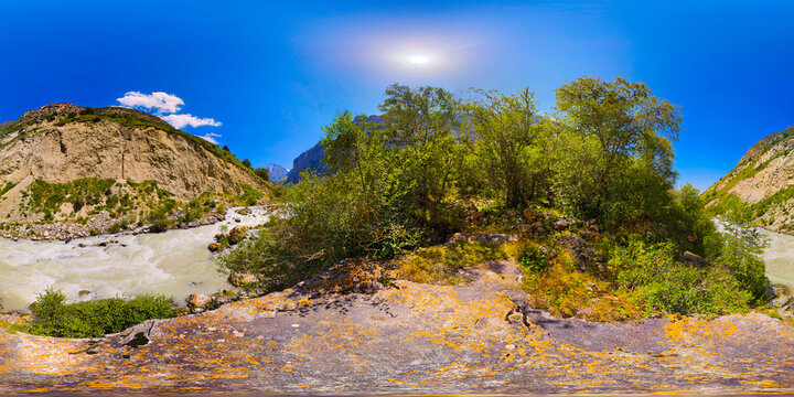 Panoramic 360 view of river flowing through mountainous valley