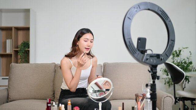Beauty blogger filming makeup tutorial with skincare routine, cosmetics review and influencer lifestyle content
