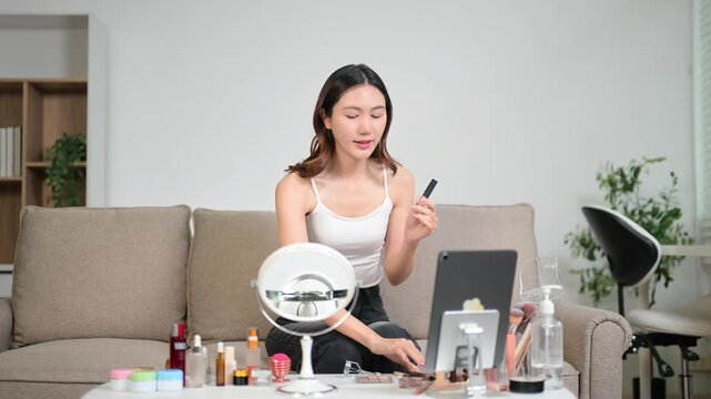Beauty blogger filming makeup tutorial with skincare routine, cosmetics review and influencer lifestyle content
