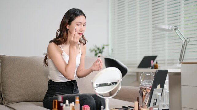 Beauty blogger filming makeup tutorial with skincare routine, cosmetics review and influencer lifestyle content
