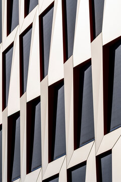 Abstract geometry pattern on modern building facade architecture with diagonal windows as a bold background for corporate business branding and design