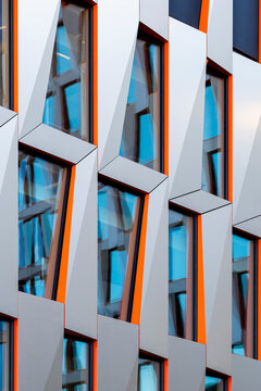 Abstract geometry pattern on modern building facade architecture with angular windows as a strong background for corporate business branding and design use