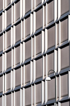 Abstract geometry pattern with symmetry on modern building facade architecture using texture as a minimal background for corporate business branding and design