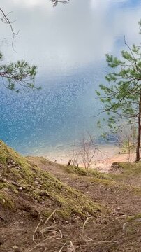 Lake Water Ripples Near Sandy Shore in Latvia