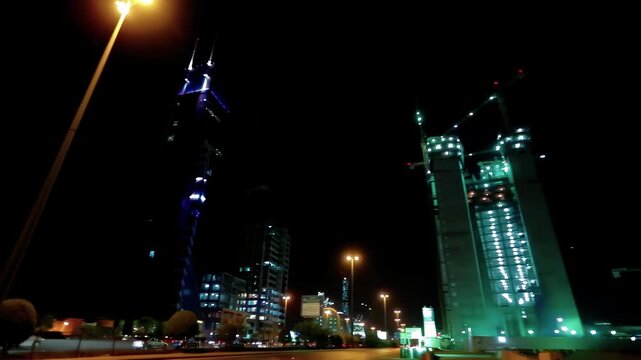 Riyadh City Skyline Aerial View Featuring Kingdom Tower and Heavy Traffic Flow on King Fahd Road, Saudi Arabia.