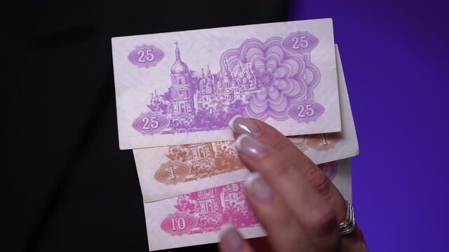 Ukrainian coupon banknotes (karbovanets Reverse -Back). The colorful paper currency with historical design elements represents economic transition, in