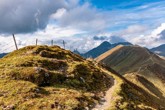 Hiking trail on a mountain ridge in the Austrian Alps