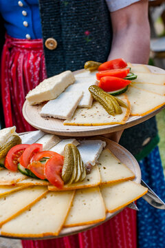 Traditional Brettljause cheese snack held in the Austrian Alps