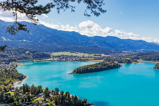 Scenic view of turquoise Lake Faaker See and island in Austria