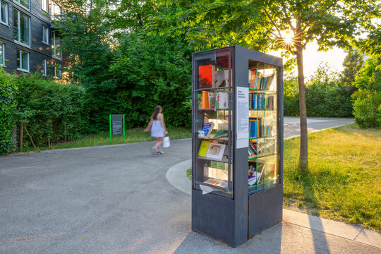 Public sharing bookshelf in a green community area in Munich, Germany