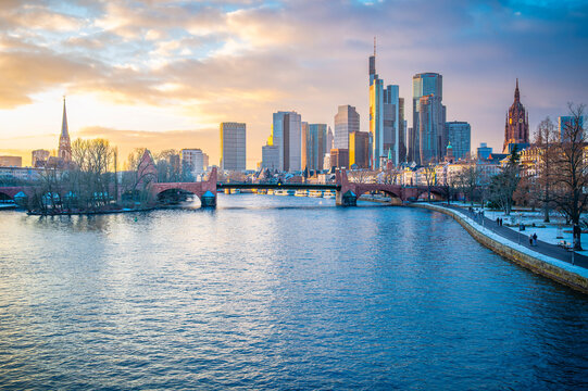 Frankfurt am Main city skyline over the river at sunset