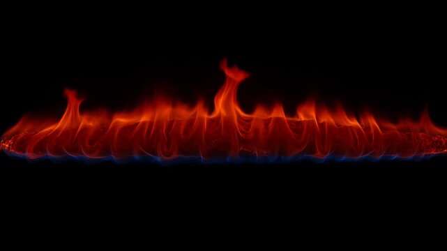 Fiery Orange Flames Dance on a Dark Black Background with Blue Accents at the Base