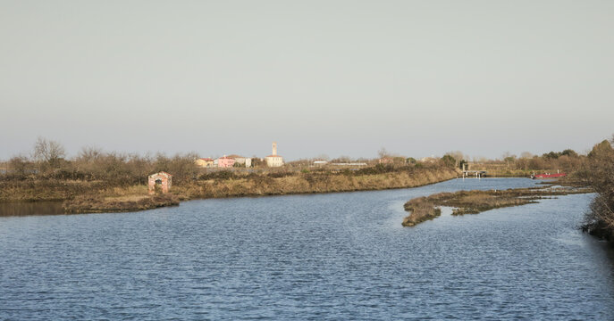 View of the small town of Lio Piccolo among the salt marshes in the Venetian lagoon